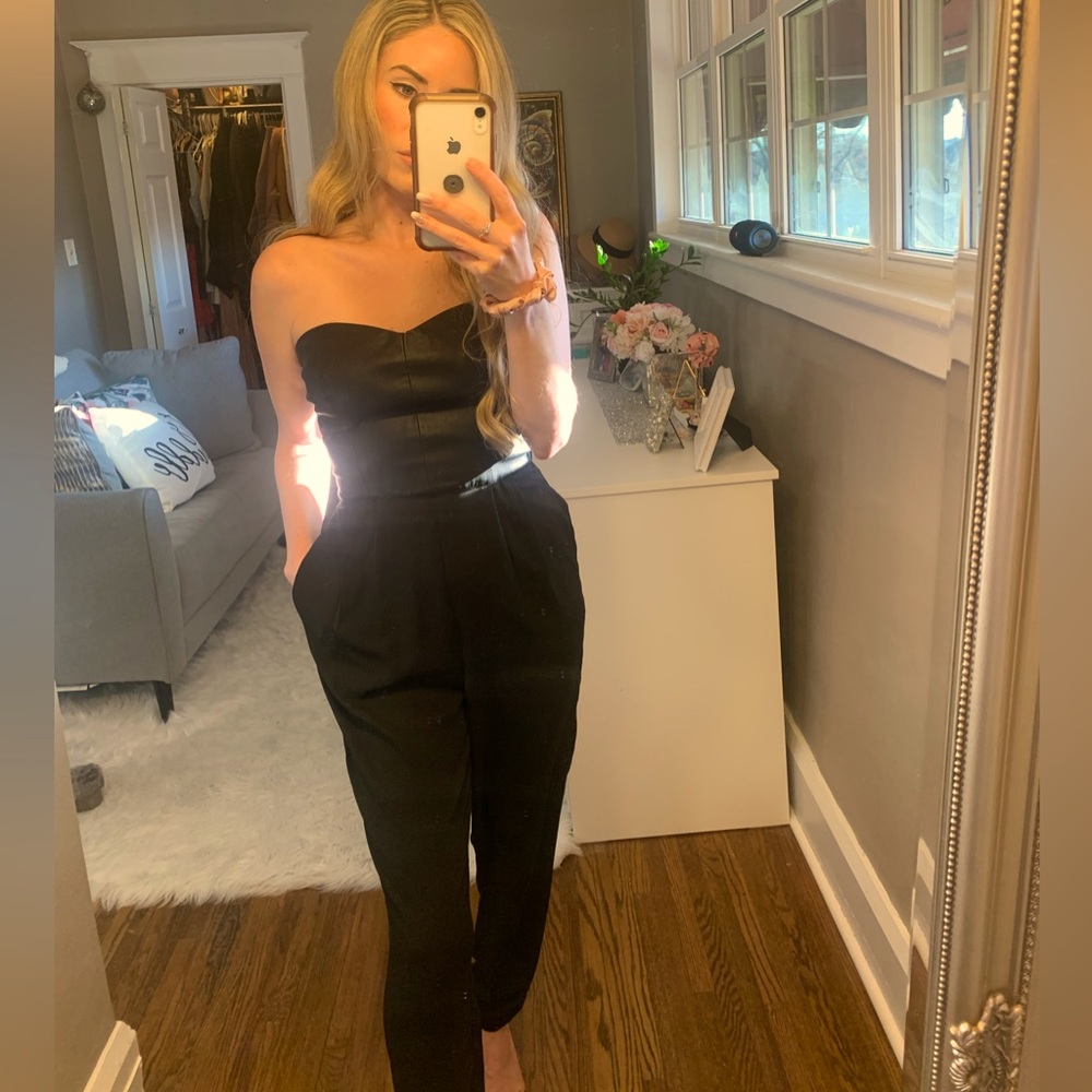 Forever 21 black jumpsuit, size small. Leather top.